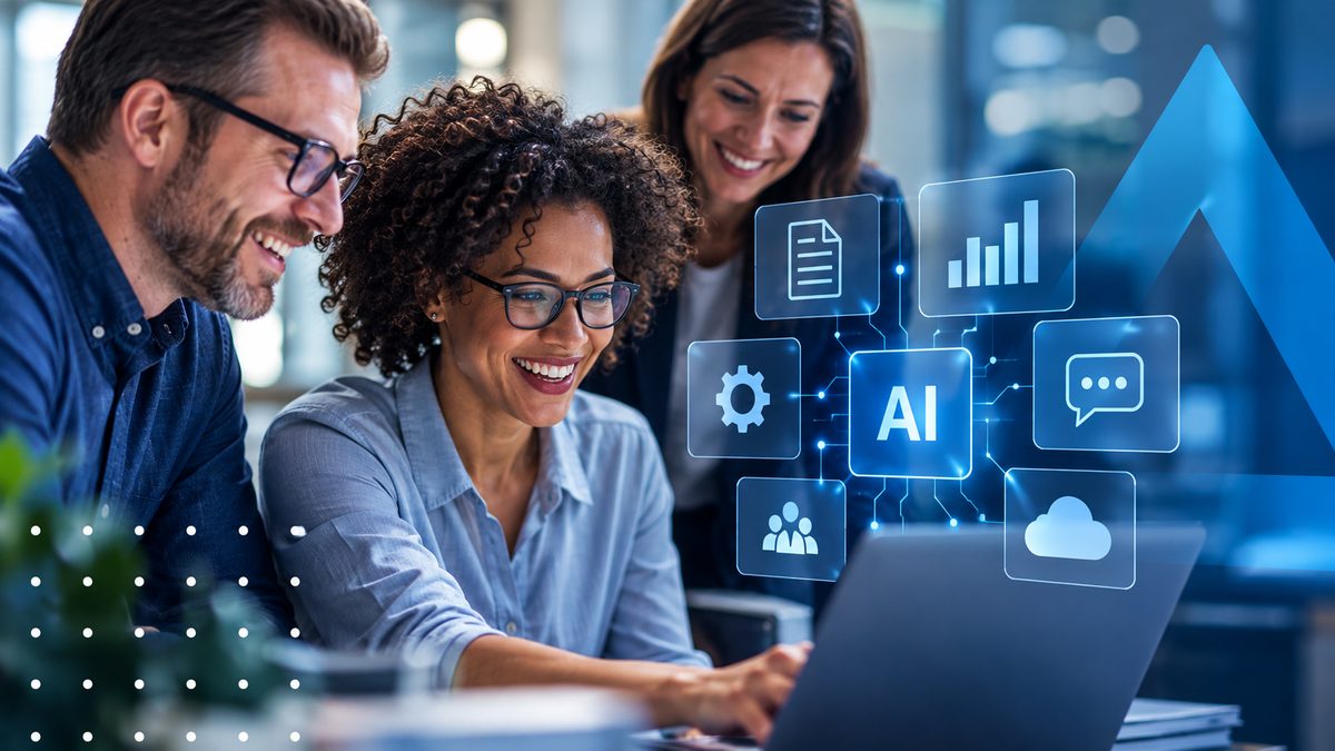 Three coworkers smiling at a laptop with AI icons floating beside the screen